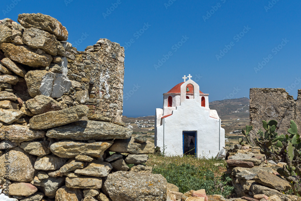 The ruins of a medieval fortress and White church, Mykonos island, Cyclades, Greece The ruins of a medieval fortress and White church, Mykonos island, Cyclades, Greece