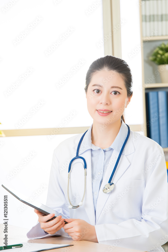 doctor using digital tablet to research patient's medical case doctor using digital tablet to research patient's medical case