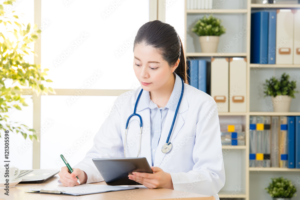 doctor drink coffee using digital tablet research patient's medi doctor drink coffee using digital tablet research patient's medi
