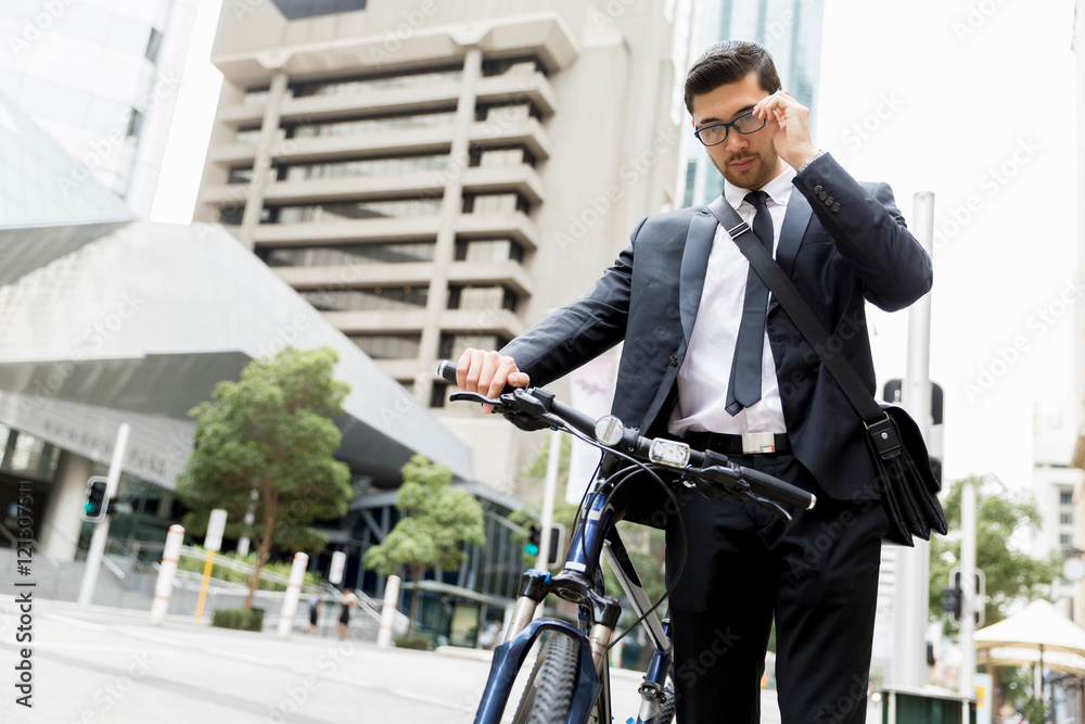 Young businessmen with a bike Young businessmen with a bike