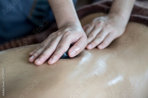 stone therapy, hot stone massage.