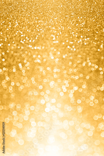 Glitzy gold glitter bokeh bling background or invite