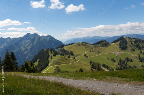 Landscape in Austrian Alps with roads and a lake