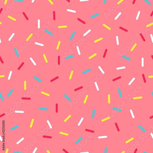 Seamless background with pink donut glaze. Decorative bright sprinkles texture pattern design