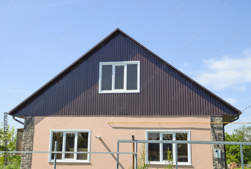 The roof of corrugated sheet on the houses The roof of corrugated sheet on the houses