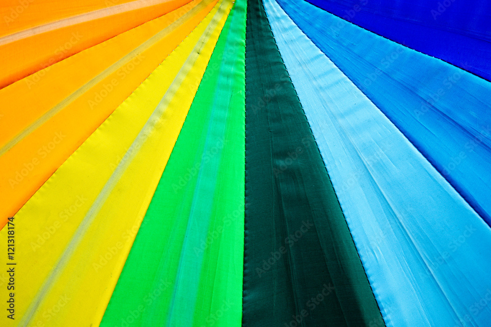 Fototapeta premium Rainbow spectrum multicolored background of an umbrella