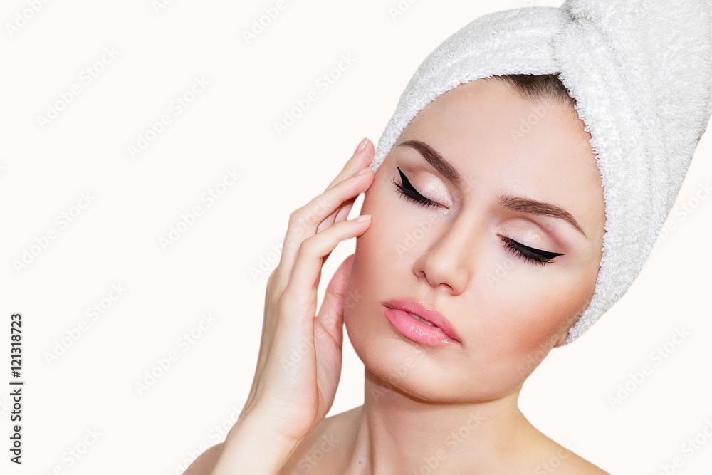 Beautiful natural girl woman after cosmetic procedures , facelift , facial massage , visit a beautician , massage lines. Beautiful woman with a towel on his head. Plastic and cosmetic surgery. Beautiful natural girl woman after cosmetic procedures , facelift , facial massage , visit a beautician , massage lines. Beautiful woman with a towel on his head. Plastic and cosmetic surgery.