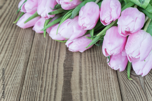Fototapeta Naklejka Na Ścianę i Meble -  Tulip flowers on the wooden background