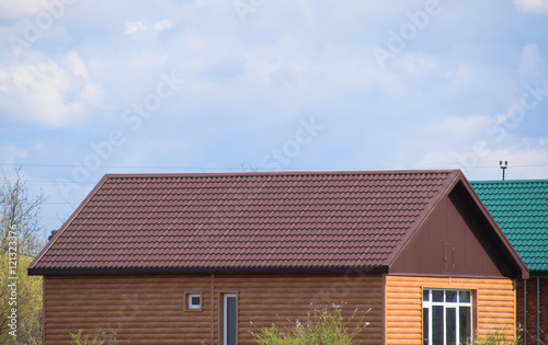 The roof of corrugated sheet on the houses © eleonimages