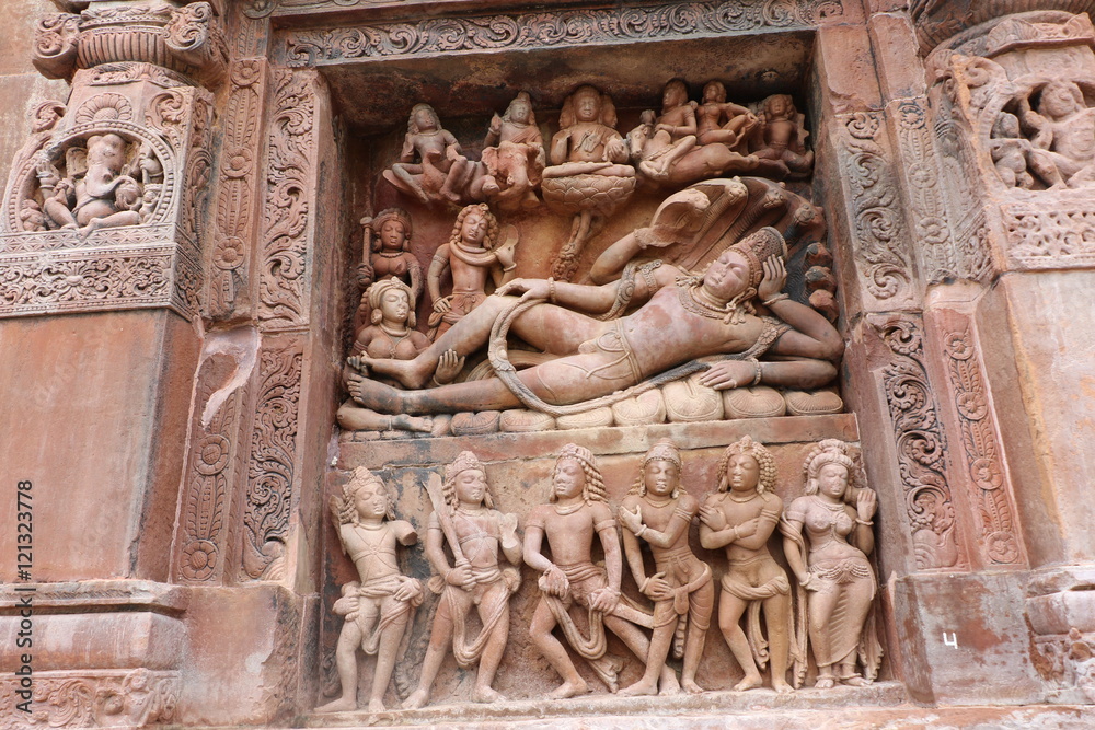 Hindu lord Vishnu lying on serpant Sheshnaga on a wall of Dashavatara Vishnu Temple of 320-600 AD, is one of the earliest Hindu stone temples to still survive today.