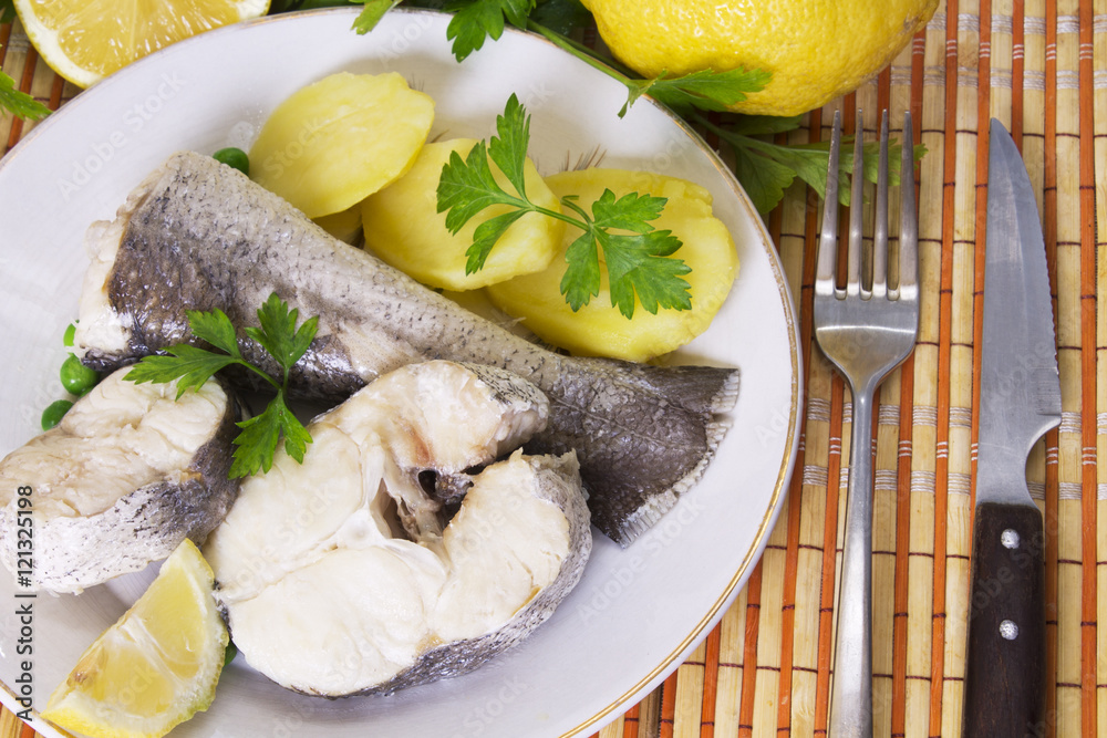 baked hake with potatoes baked hake with potatoes
