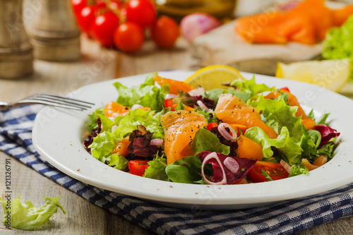 Fresh salad with smoked salmon.