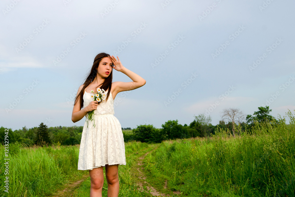 girl in field of flowers