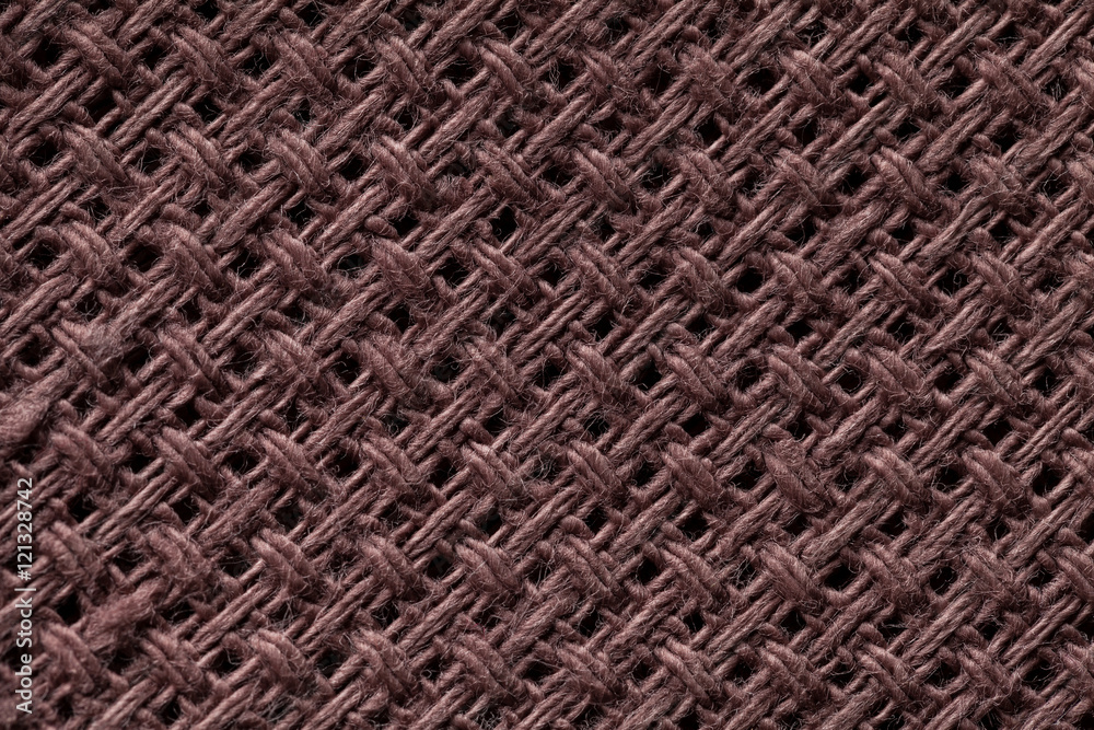 Brown textile background closeup. Structure of the fabric macro. Brown textile background closeup. Structure of the fabric macro.