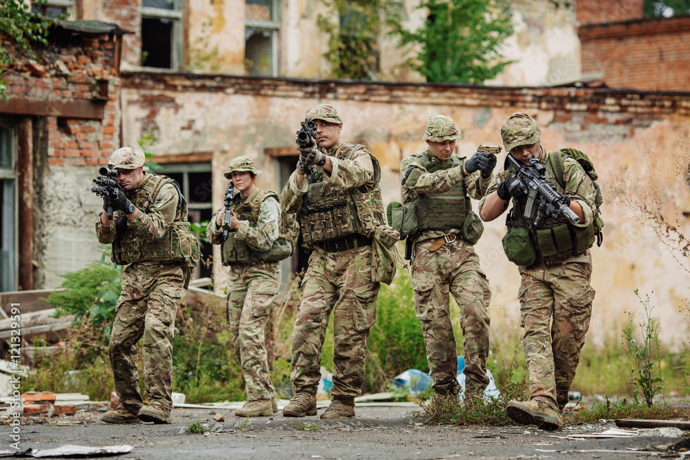Fototapeta premium Army sniper team during the military operation in the city. war,