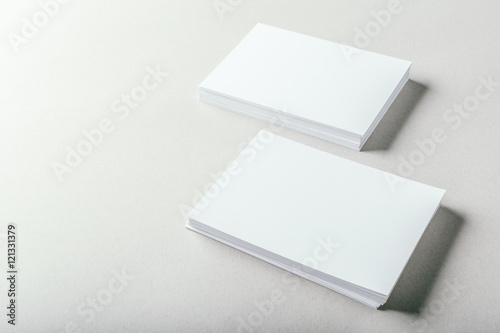 blank business cards on grey background © fotofabrika