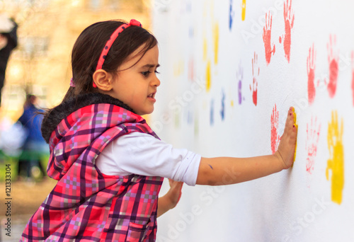 Hand prints, wall painting activity that child.