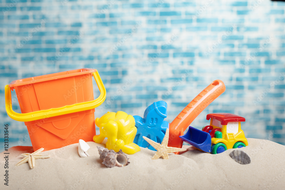 Children's toys on sand