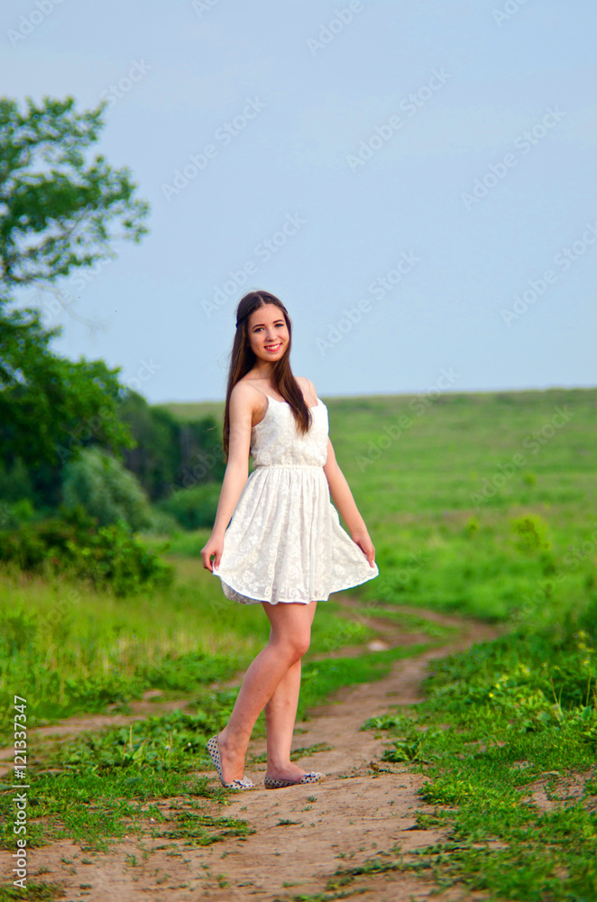girl in white dress in field girl in white dress in field