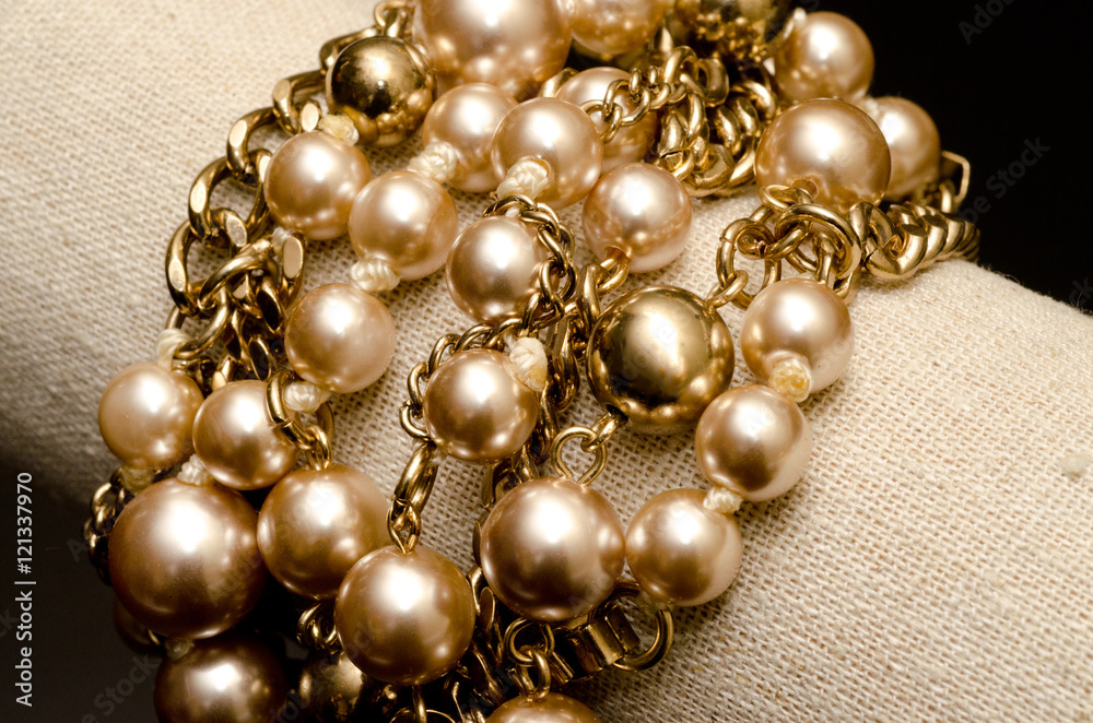 Golden pearls with golden chain links bracelet Golden pearls with golden chain links bracelet