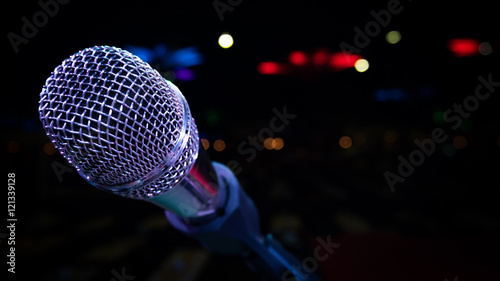 microphone stand on the stage venue with blur bokeh background