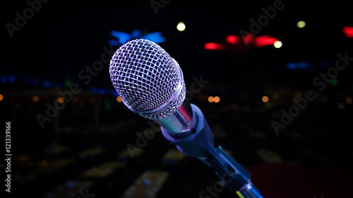 microphone stand on the stage venue with blur bokeh background