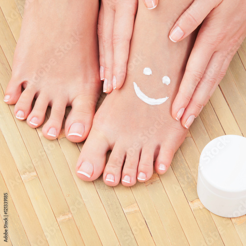 Care for beautiful woman skin. Pedicure and manicure