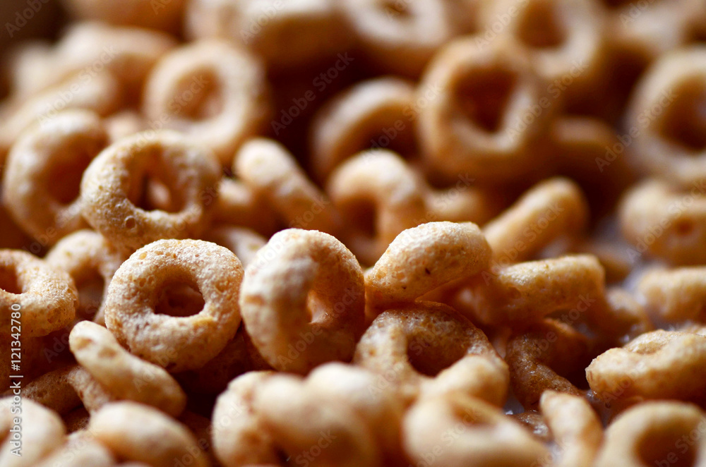 Cheerios - Bowl with cheerios whole grain cereals. Cheerios - Bowl with cheerios whole grain cereals.
