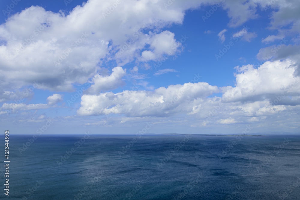 Atlantic ocean and blue cloudy sky, Aran islands
