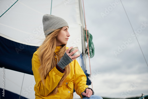 Young woman on the sailboat
