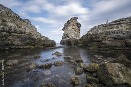 huge rocks on the sea with long exposure shot