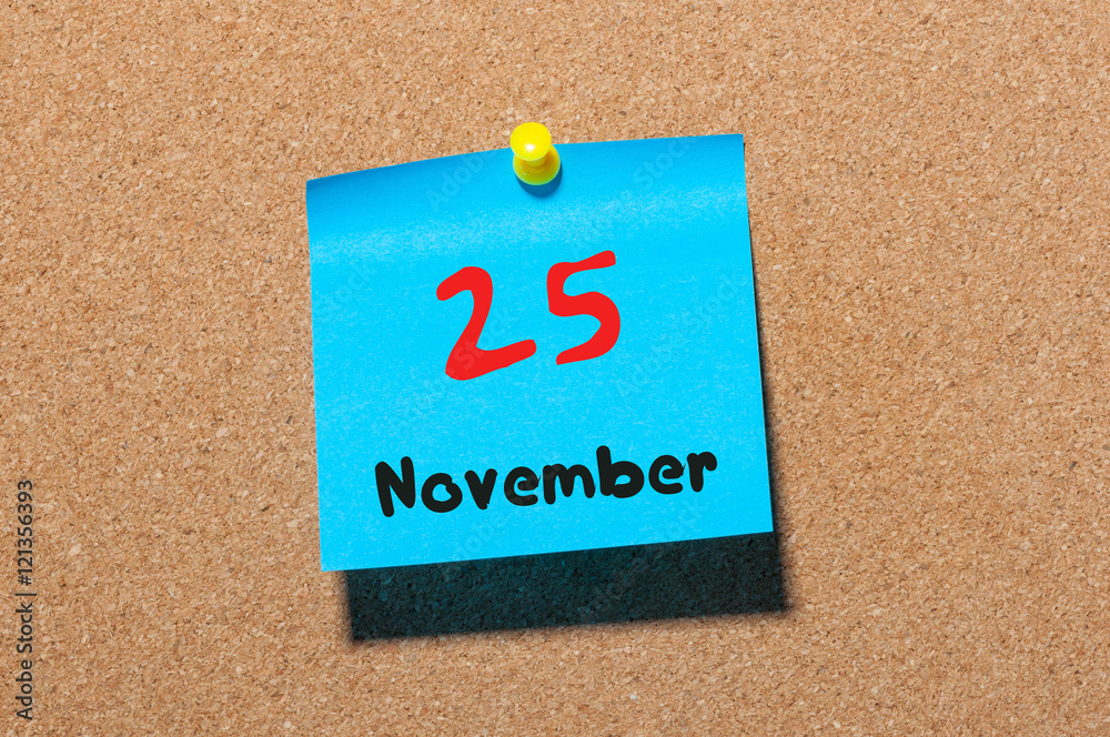 November 25th. Day 25 of month, color sticker calendar on notice board. Autumn time. Empty space for text November 25th. Day 25 of month, color sticker calendar on notice board. Autumn time. Empty space for text