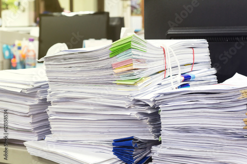 pile of document on desk