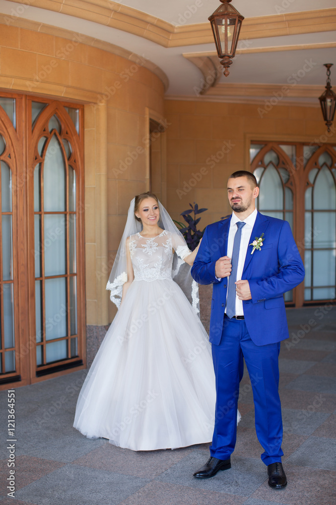 Fototapeta premium Newlyweds on a walk in the countryside