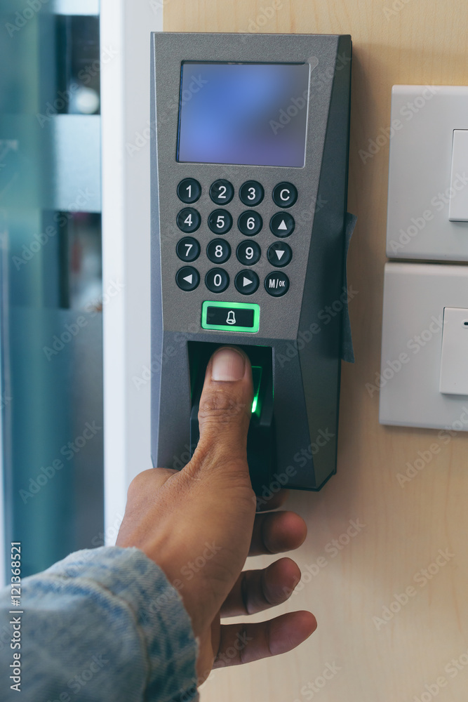 Thumb on The fingerprint scanner to record working time. Thumb on The fingerprint scanner to record working time.