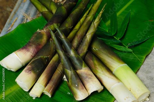 Fototapeta Naklejka Na Ścianę i Meble -  Bamboo shoots on green banana leaf