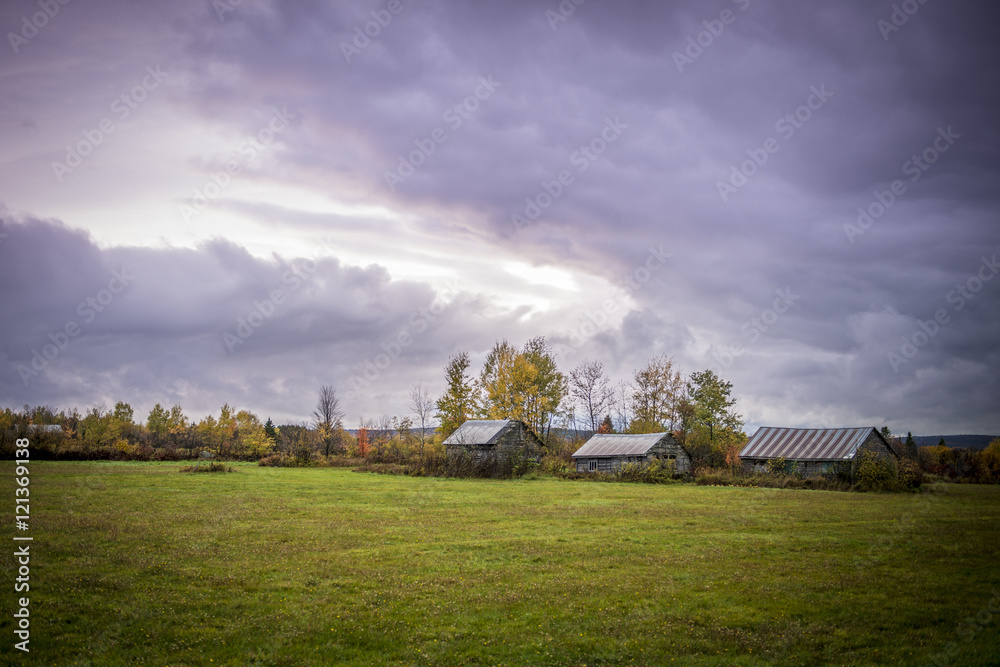 Wooden barns in countryside in Quebec