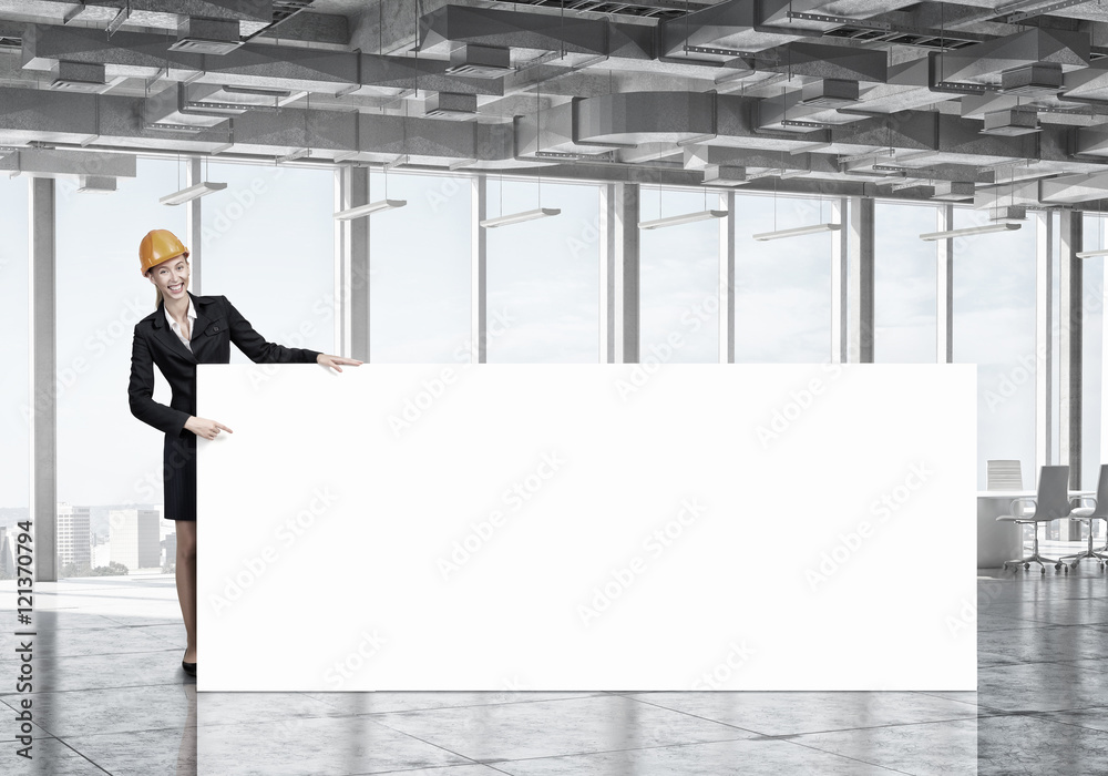Woman engineer with banner . Mixed media Woman engineer with banner . Mixed media