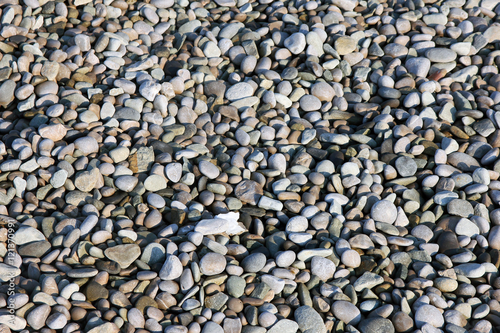 texture of beautiful dry round colored sea pebbles on pebble bea texture of beautiful dry round colored sea pebbles on pebble bea