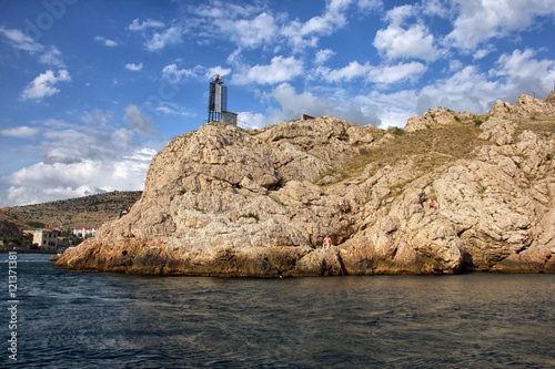 blue sea and sand mountains and blue sky on wild rocky crimean c