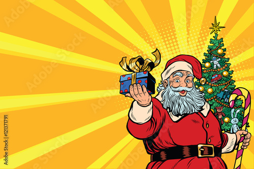 Santa Claus Christmas tree and gift, copy space left