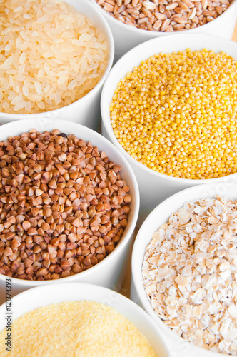 Different kinds of cereals: oats, millet, rice, buckwheat, wheat, spelt 