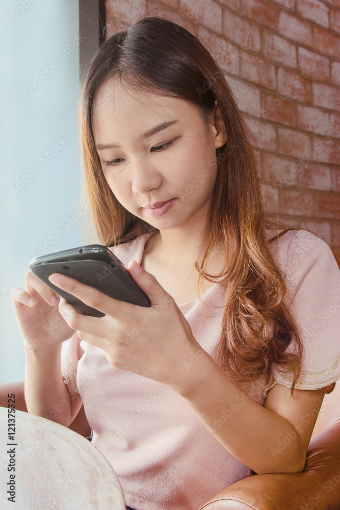 Cafe city lifestyle woman on phone texting text message on smart Cafe city lifestyle woman on phone texting text message on smart