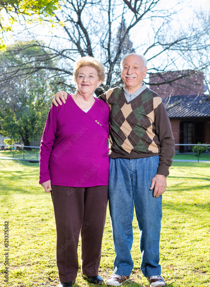 Happy senior couple relaxing outdoor on a sunny day Happy senior couple relaxing outdoor on a sunny day