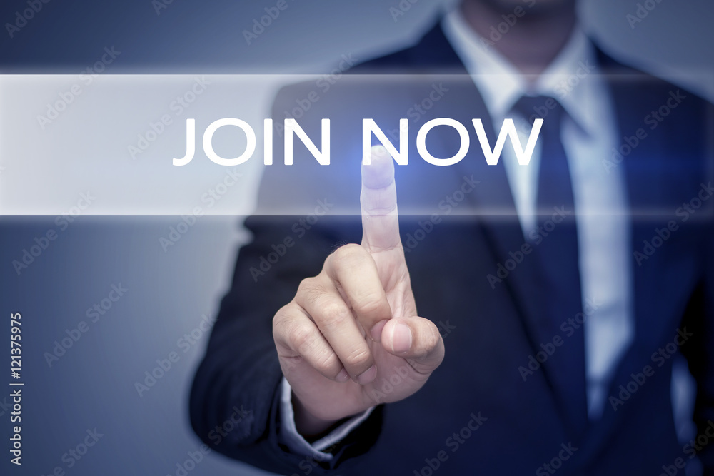 Businessman hand touching JOIN NOW button on virtual screen Businessman hand touching JOIN NOW button on virtual screen
