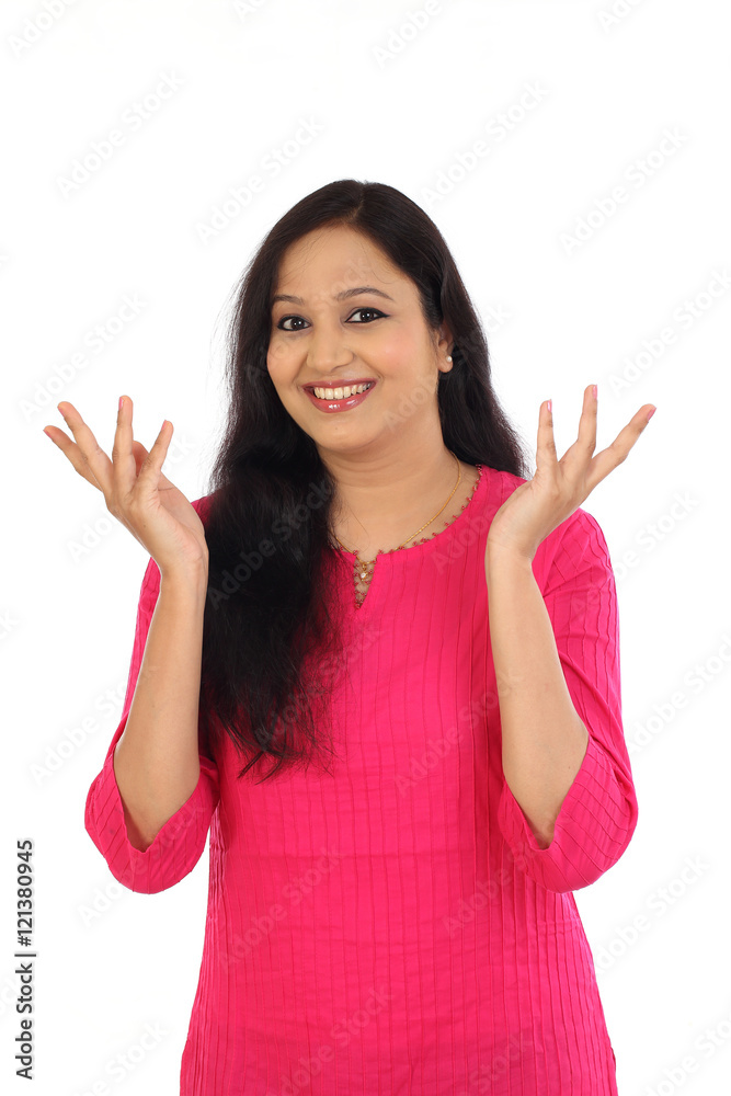 Excited young indian woman against white background Excited young indian woman against white background