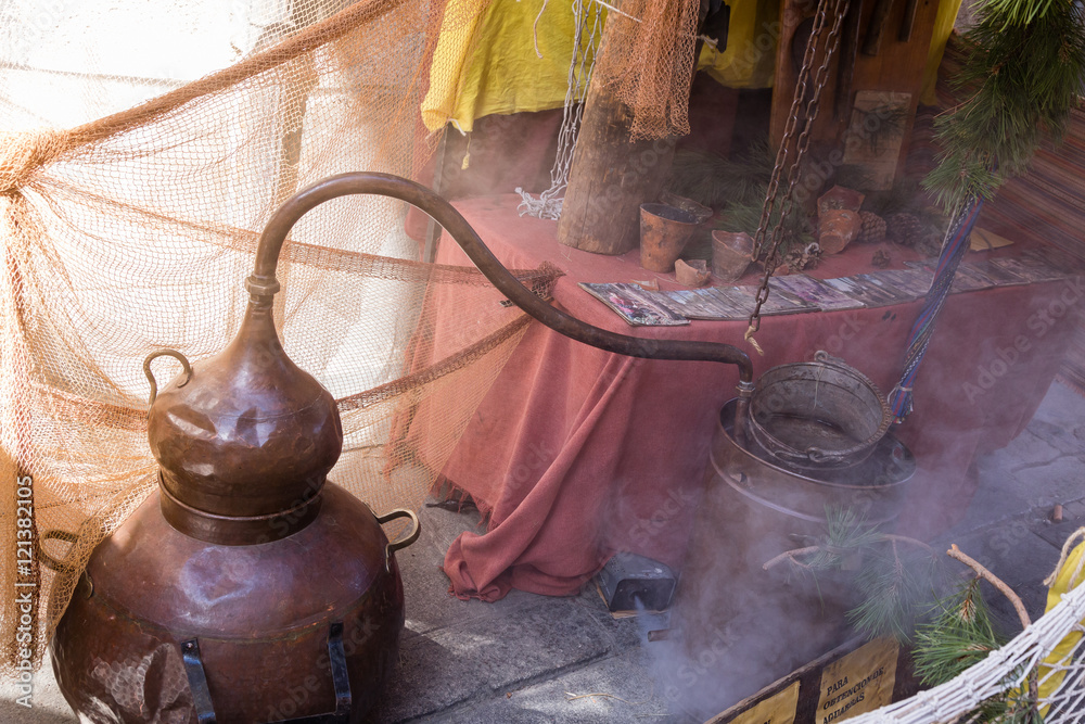 Ταπετσαρία recreation of an old brass alembic for the production of alcoholic beverages