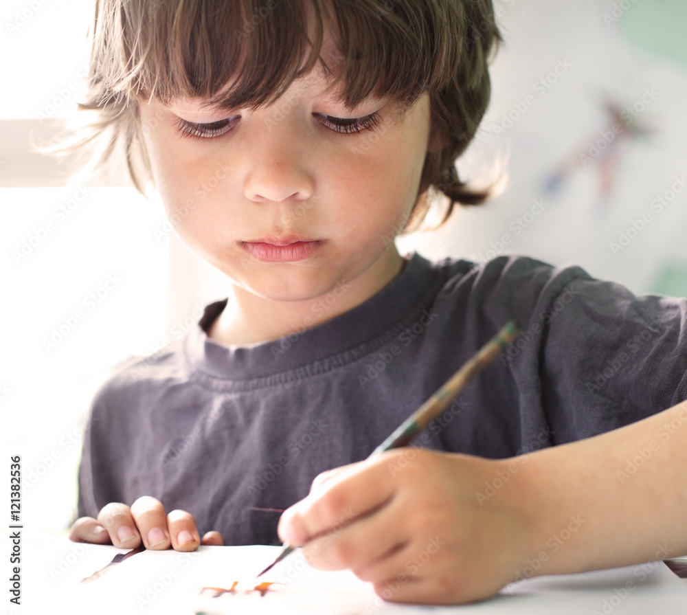 Children draw in home, Boy studying drawing at school Children draw in home, Boy studying drawing at school