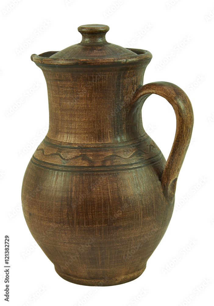 Ceramic jug of hand-made clay. Isolated on a white background