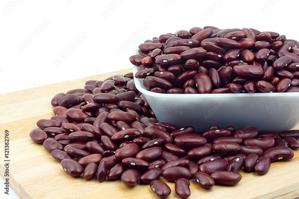 Red bean in white plastic bowl and wooden table. Ingredient bean Red bean in white plastic bowl and wooden table. Ingredient bean